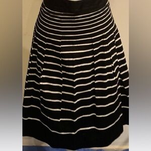 Talbots NWOT black skirt with white horizontal stripes, pleated size 16.